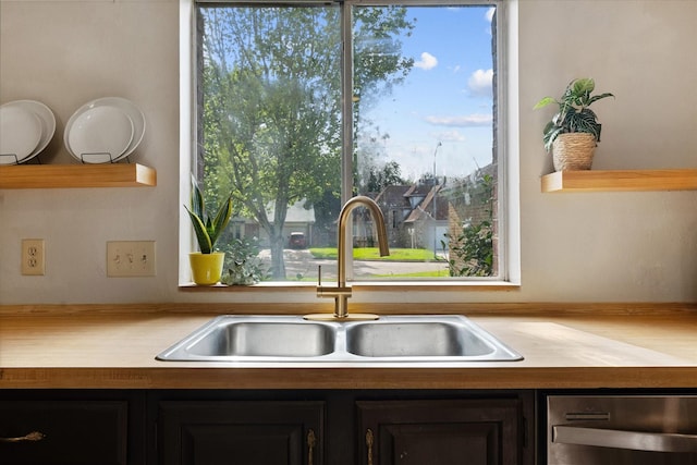 8411 Lylewood Ct, Houston, TX 77040 - kitchen featuring dishwasher, plenty of natural light, and light countertops