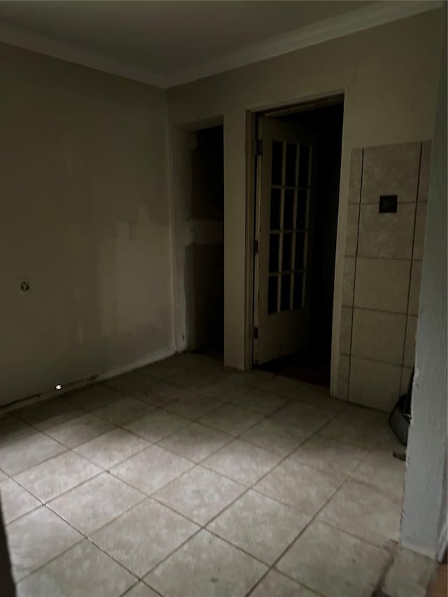 4730 Angleton St, Houston, TX 77033 - empty room with ornamental molding and light tile patterned floors
