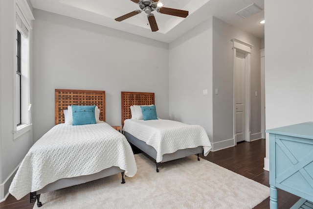 5825 Petty St, Houston, TX 77007 - bedroom with dark wood-style flooring, a ceiling fan, recessed lighting, and multiple windows