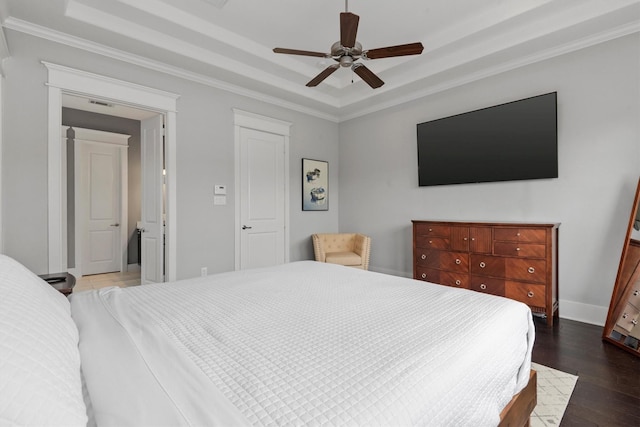 5825 Petty St, Houston, TX 77007 - bedroom featuring a raised ceiling, wood finished floors, ornamental molding, and a ceiling fan