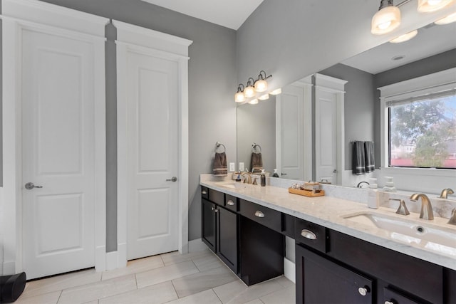 5825 Petty St, Houston, TX 77007 - full bathroom with double vanity and tile patterned floors
