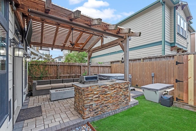 5825 Petty St, Houston, TX 77007 - fenced backyard featuring a patio area, an outdoor living space with a fire pit, a pergola, and exterior kitchen