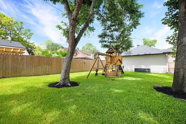 10603 Wagon Trail Rd, Houston, TX 77064 - fenced backyard featuring a playground