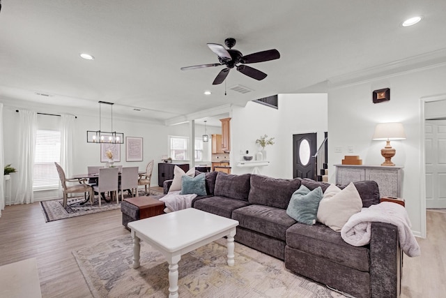 10603 Wagon Trail Rd, Houston, TX 77064 - living area with plenty of natural light, ornamental molding, ceiling fan, light wood-type flooring, and recessed lighting