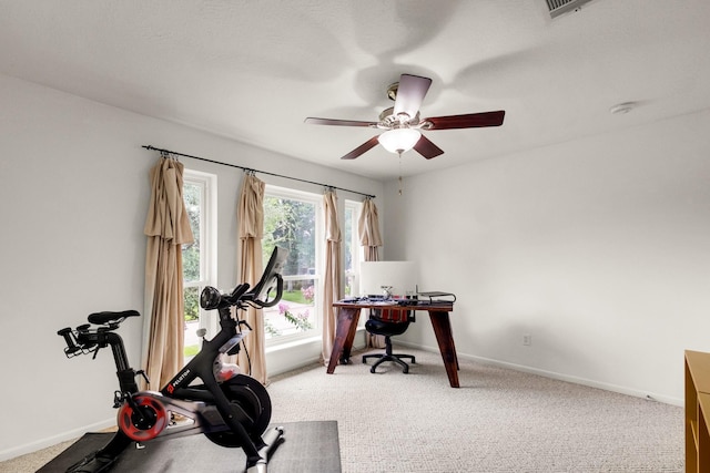 10603 Wagon Trail Rd, Houston, TX 77064 - workout area with a ceiling fan and light colored carpet