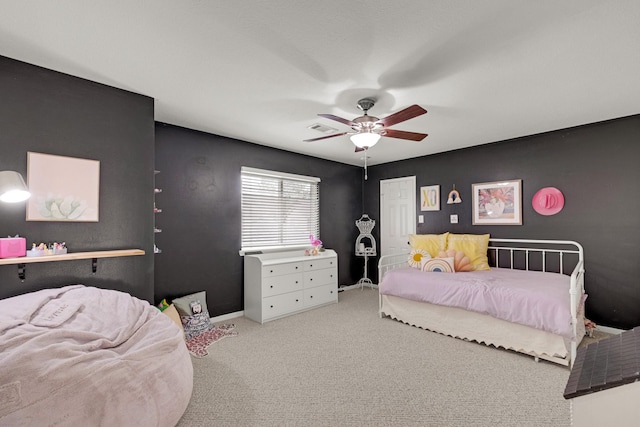 10603 Wagon Trail Rd, Houston, TX 77064 - carpeted bedroom featuring a ceiling fan and baseboards