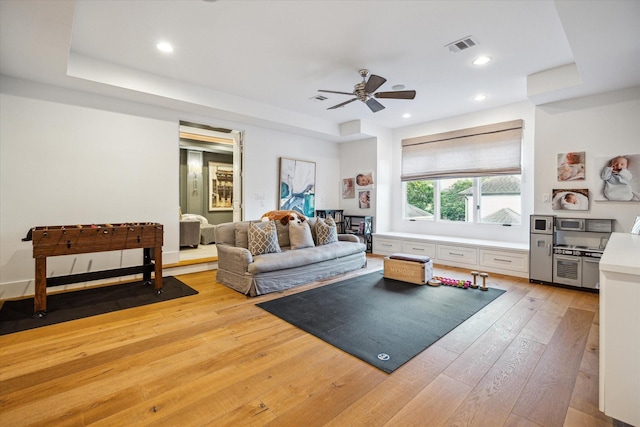 3835 Merrick St, Houston, TX 77025 - living area featuring ceiling fan, light wood-style floors, and recessed lighting