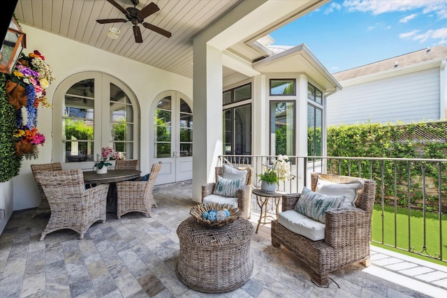3835 Merrick St, Houston, TX 77025 - view of patio / terrace with french doors, a ceiling fan, and outdoor dining area