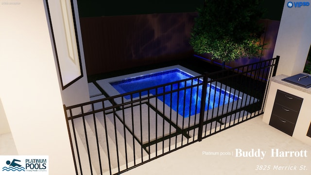 3835 Merrick St, Houston, TX 77025 - view of pool featuring a pool, a jacuzzi, and exterior kitchen