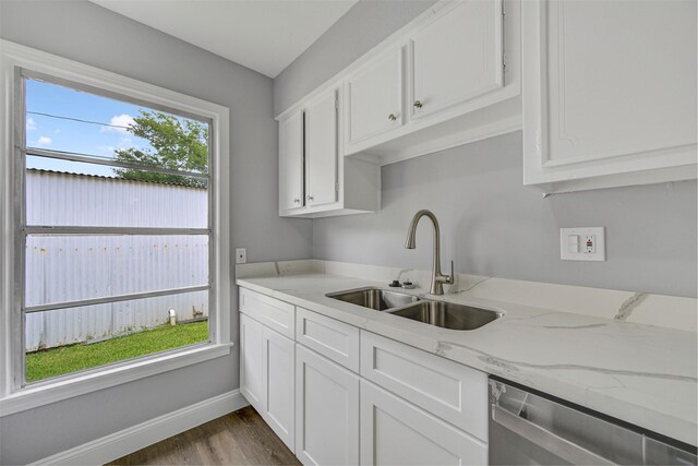 1705 13th St, Galena Park, TX 77547 - kitchen featuring white cabinets, dark wood-style flooring, and stainless steel dishwasher