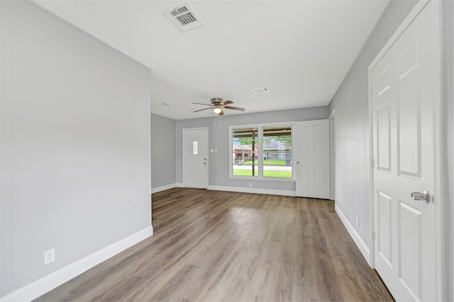 1705 13th St, Galena Park, TX 77547 - empty room featuring wood finished floors and a ceiling fan