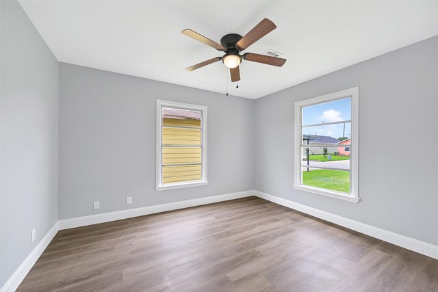 1705 13th St, Galena Park, TX 77547 - spare room with wood finished floors and a ceiling fan
