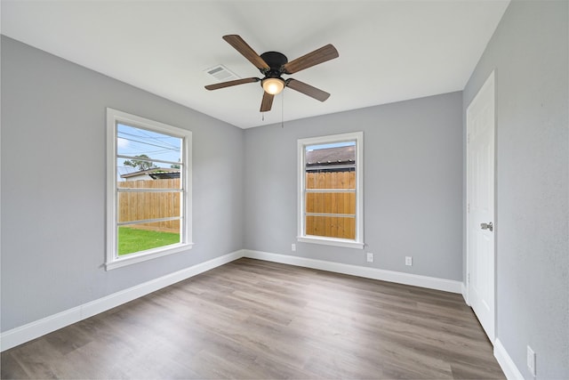 1705 13th St, Galena Park, TX 77547 - spare room featuring wood finished floors and ceiling fan