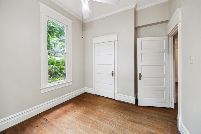 519 Bayland Ave, Houston, TX 77009 - unfurnished bedroom with crown molding and hardwood / wood-style floors