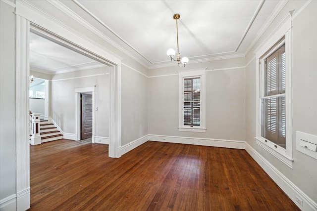 519 Bayland Ave, Houston, TX 77009 - unfurnished room featuring a chandelier, plenty of natural light, hardwood / wood-style floors, stairway, and ornamental molding
