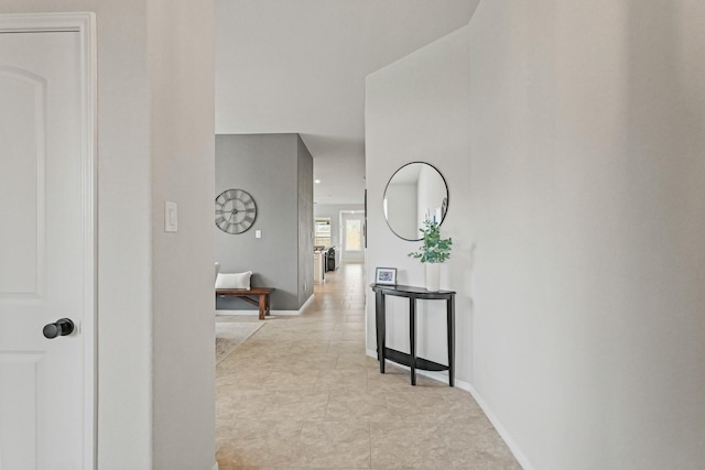 18015 Van Berkel Ln, Houston, TX 77044 - hallway featuring baseboards and light tile patterned floors