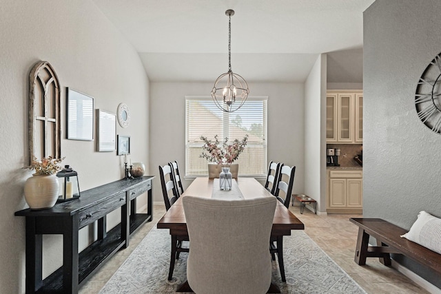 18015 Van Berkel Ln, Houston, TX 77044 - dining space featuring a chandelier and vaulted ceiling