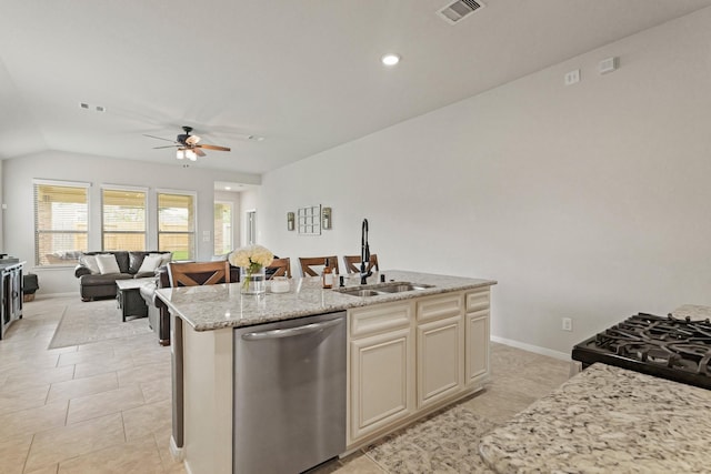 18015 Van Berkel Ln, Houston, TX 77044 - kitchen with dishwasher, a ceiling fan, a kitchen island with sink, open floor plan, and light stone countertops