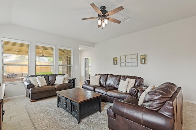 18015 Van Berkel Ln, Houston, TX 77044 - living room featuring ceiling fan and lofted ceiling