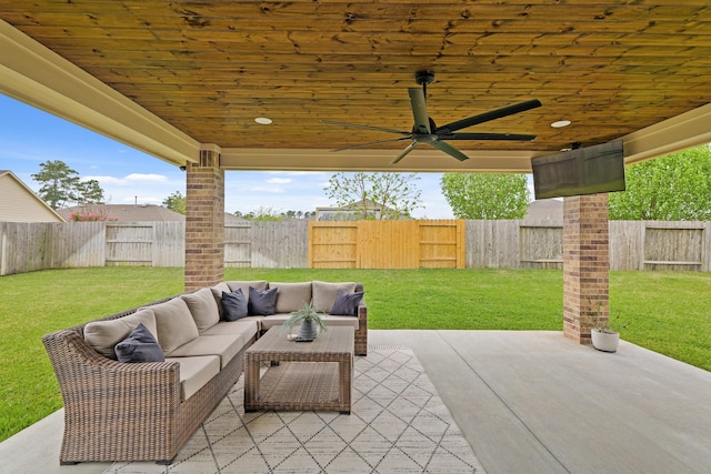 18015 Van Berkel Ln, Houston, TX 77044 - fenced backyard with outdoor lounge area and a patio area