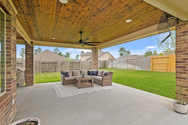18015 Van Berkel Ln, Houston, TX 77044 - fenced backyard featuring an outdoor hangout area, a patio, and ceiling fan