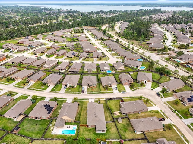 18015 Van Berkel Ln, Houston, TX 77044 - aerial view of property's location with nearby suburban area and a nearby body of water