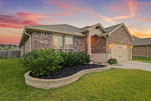 18015 Van Berkel Ln, Houston, TX 77044 - single story home featuring an attached garage, driveway, brick siding, and roof with shingles