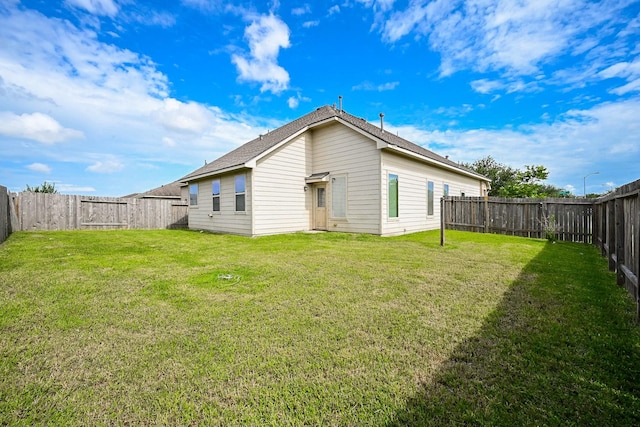 20603 Flintoff Ln, Katy, TX 77449 - back of property featuring a fenced backyard and roof with shingles