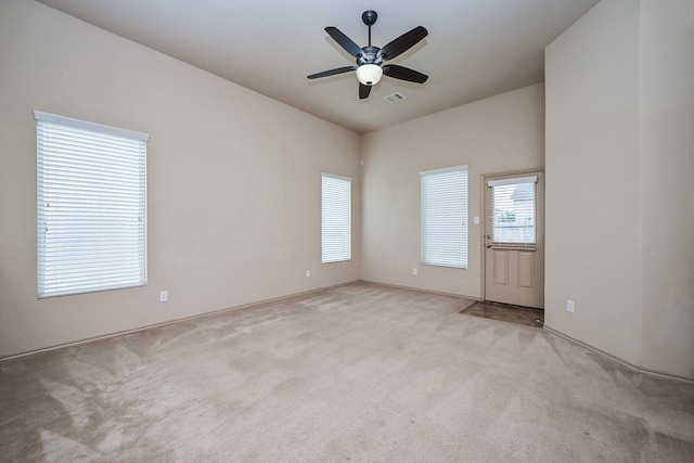 20603 Flintoff Ln, Katy, TX 77449 - unfurnished room featuring ceiling fan, light carpet, and vaulted ceiling