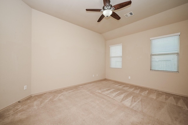 20603 Flintoff Ln, Katy, TX 77449 - empty room featuring light carpet, a ceiling fan, and lofted ceiling