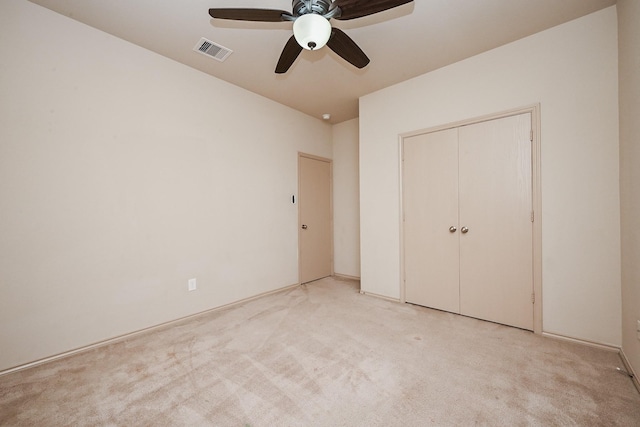 20603 Flintoff Ln, Katy, TX 77449 - unfurnished bedroom featuring light carpet, a closet, and ceiling fan
