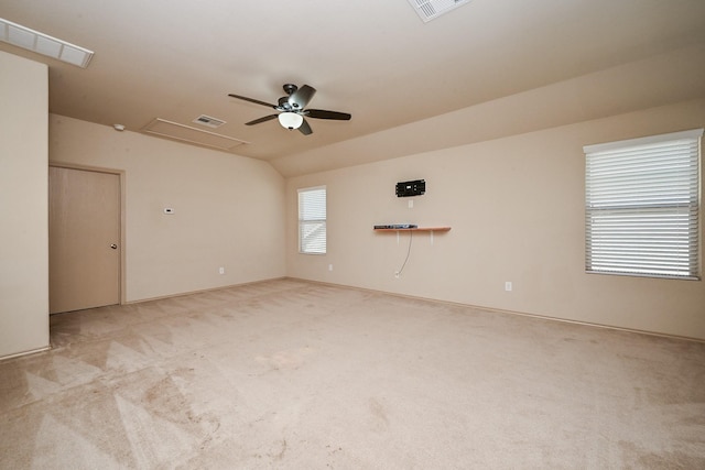 20603 Flintoff Ln, Katy, TX 77449 - spare room with attic access, carpet, ceiling fan, and vaulted ceiling