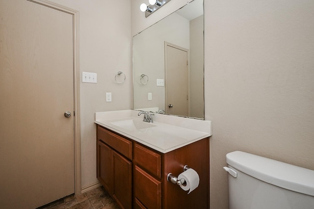20603 Flintoff Ln, Katy, TX 77449 - bathroom featuring vanity and stone finish floors