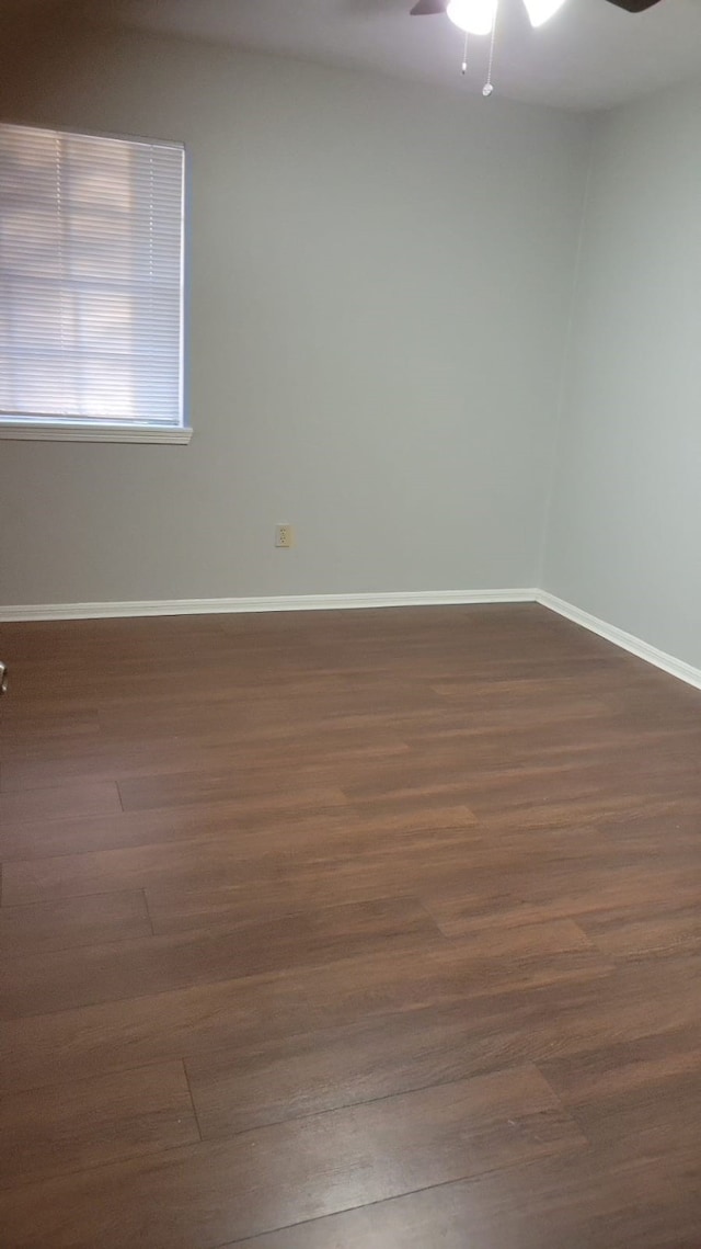 5703 Green Timbers Dr, Humble, TX 77346 - unfurnished room featuring ceiling fan and dark wood-style floors