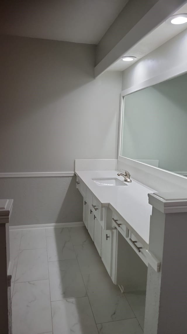 5703 Green Timbers Dr, Humble, TX 77346 - bathroom with vanity and marble look tile flooring