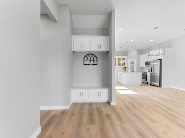 1200 Sailfish Dr, Bay City, TX 77414 - mudroom featuring a chandelier, light wood-type flooring, and recessed lighting