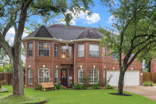 7938 S Wellington Ct, Houston, TX 77055 - view of front facade with brick siding, driveway, a garage, and roof with shingles