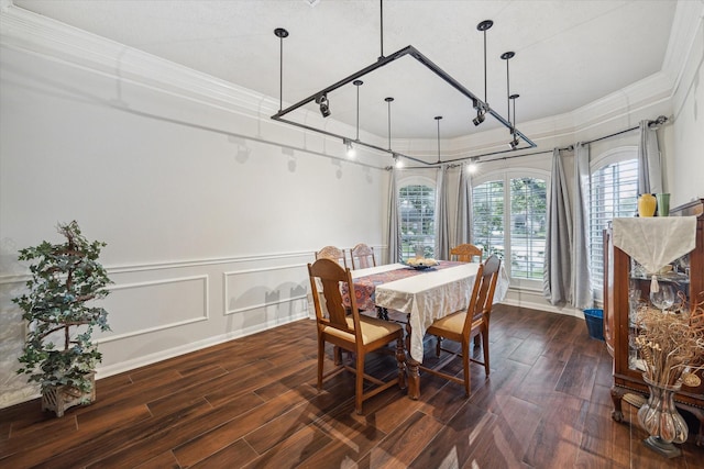 7938 S Wellington Ct, Houston, TX 77055 - dining space with crown molding, dark wood-type flooring, and rail lighting