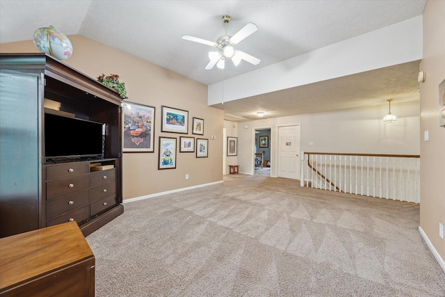 7938 S Wellington Ct, Houston, TX 77055 - unfurnished living room featuring a ceiling fan and carpet flooring