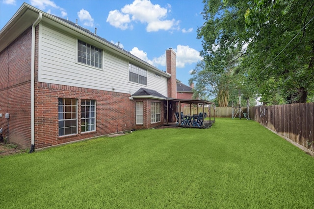 7938 S Wellington Ct, Houston, TX 77055 - rear view of property with brick siding, a chimney, a fenced backyard, and a patio area