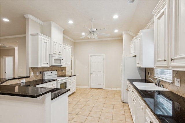 3418 Nottingham Ln, Montgomery, TX 77356 - kitchen featuring white appliances, a ceiling fan, recessed lighting, dark countertops, and decorative backsplash