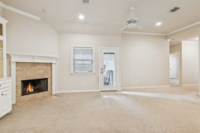 3418 Nottingham Ln, Montgomery, TX 77356 - unfurnished living room with light carpet, a ceiling fan, a fireplace, ornamental molding, and recessed lighting