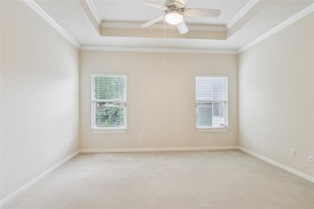3418 Nottingham Ln, Montgomery, TX 77356 - spare room with a raised ceiling, ornamental molding, light colored carpet, and ceiling fan