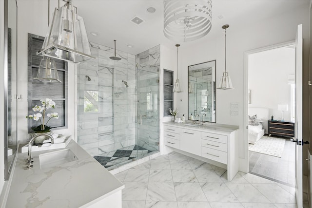 1220 Bomar St, Houston, TX 77006 - full bathroom featuring vanity, a shower stall, ensuite bathroom, marble finish flooring, and recessed lighting