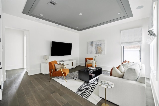 1220 Bomar St, Houston, TX 77006 - living area featuring a raised ceiling, dark wood finished floors, and recessed lighting