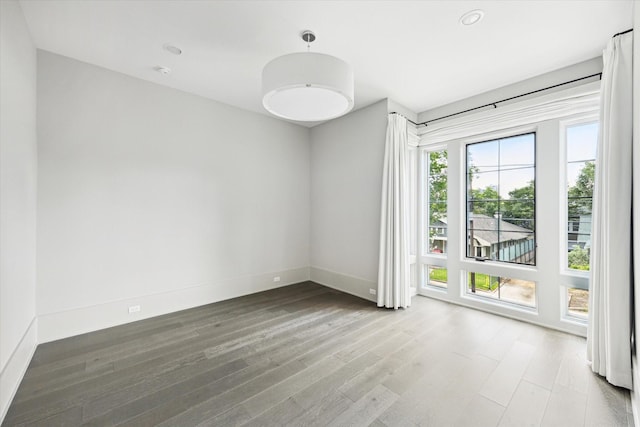 1220 Bomar St, Houston, TX 77006 - empty room with wood finished floors