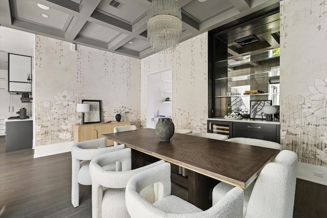1220 Bomar St, Houston, TX 77006 - dining space with coffered ceiling, dark wood-style floors, beamed ceiling, a chandelier, and a bar