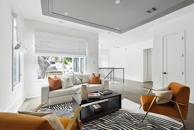 1220 Bomar St, Houston, TX 77006 - living area with recessed lighting, wood finished floors, and a tray ceiling