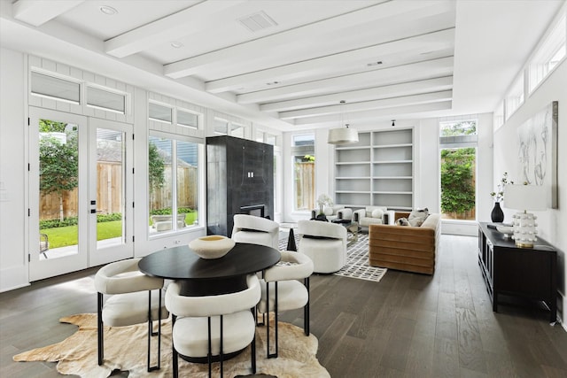 1220 Bomar St, Houston, TX 77006 - sunroom with french doors, beam ceiling, and plenty of natural light