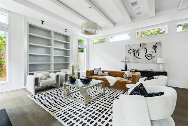 1220 Bomar St, Houston, TX 77006 - living area featuring wood finished floors, beamed ceiling, and built in features